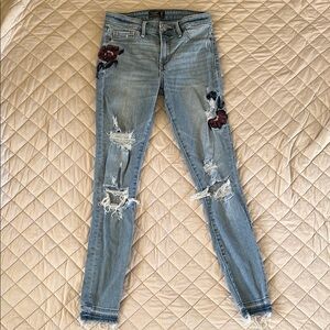 Abercrombie & Fitch Distressed Blue Jeans with Floral Embroidery
